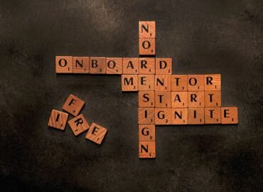 a scrabble of words that say no on board, mentor, start,